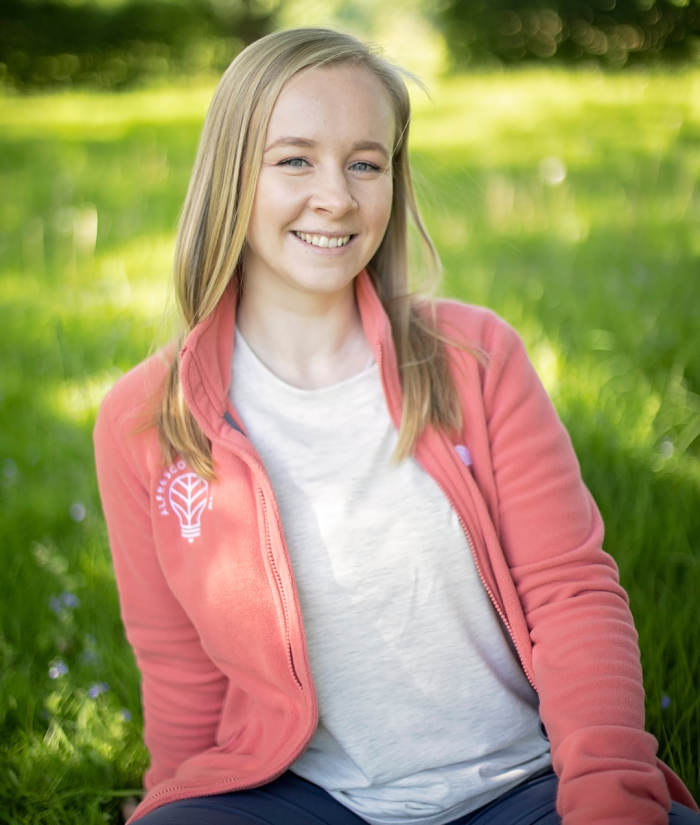 A smiling photo of Co-Founder Hollie Hindle
