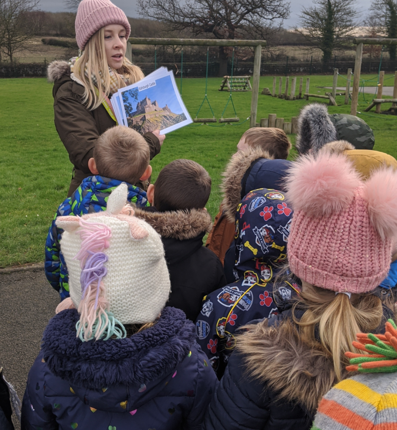 Children listening to the castles outdoor workshop