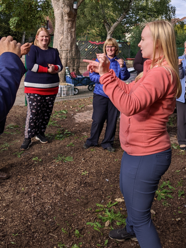 An Alfresco Learning staff member training teachers in taking the curriculum outdoors