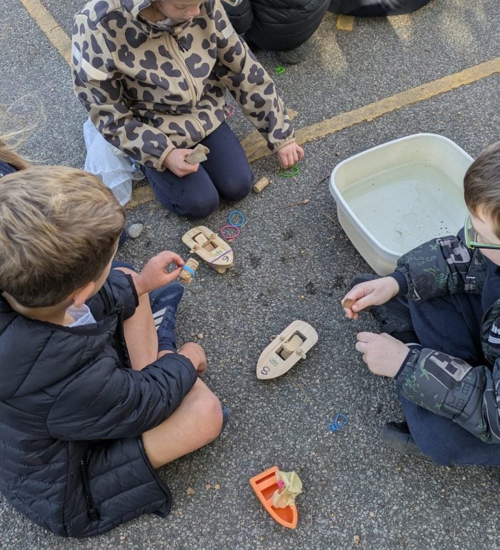 Children creating paddle boats
